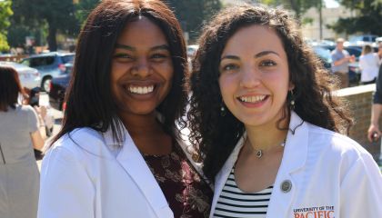 PharmD students wearing white coats