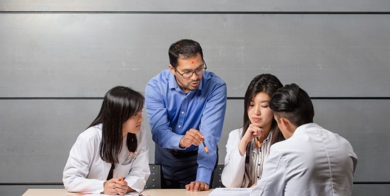 Sachin Shah with PharmD students in classroom