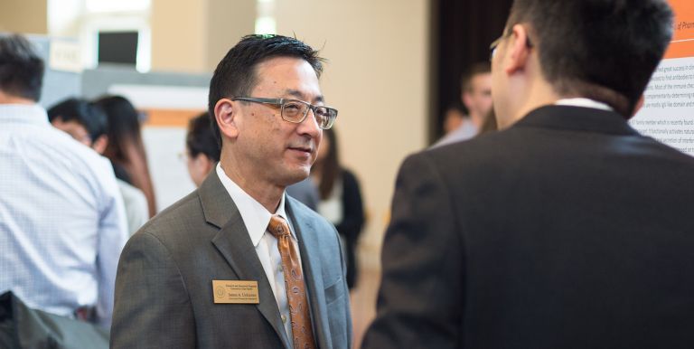 Jim Uchizono with student