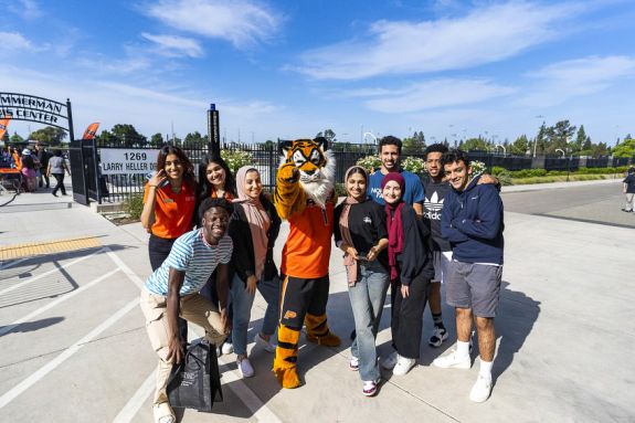 Powercat and students on the Stockton campus