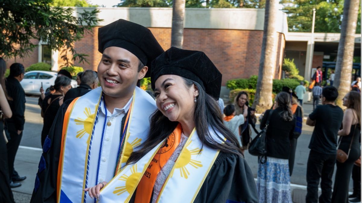 Darrin Baluyot ’23 and Janize Sarmiento ’23 celebrate their graduation at McGeorge School of Law’s Annual Unity Graduation in 2023.
