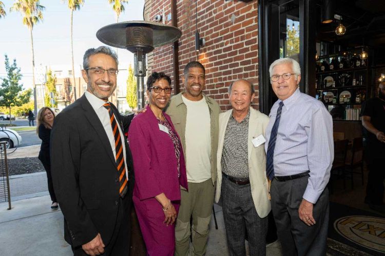Before the tour, Dugoni School leaders shared updates at a reception at Fixins Soul Kitchen. Pictured (left to right): Dr. Nader Nadershahi, Dr. Kim Benton, Sacramento Mayor Kevin Johnson, Dr. Ken Fat, Dr. Bill Sands. 