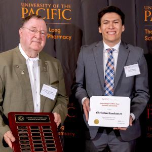 Pharmacy student Christian Barrientos with alumni donor Gerald D. Griffin