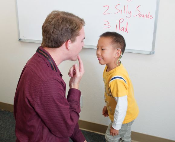 Speech-language pathology student with Stockton RiteCare Childhood Language Center client