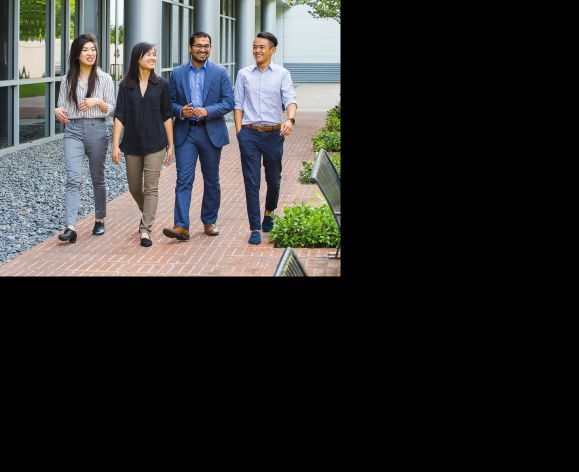 Sachin Shah walks with PharmD students on North Campus