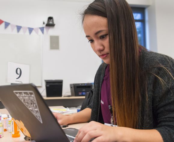 PharmD student on laptop