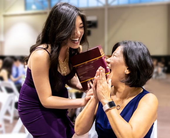 Graduate and faculty member at the Graduation Banquet