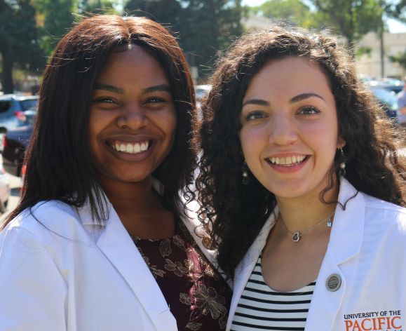 PharmD students in white coats