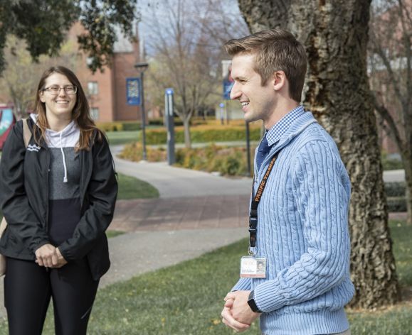 Staff member leads a campus tour