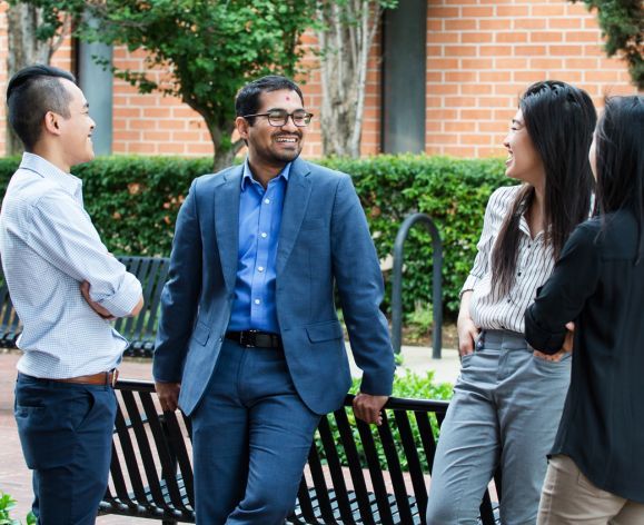 Professor Sachin Shah outside with PharmD students