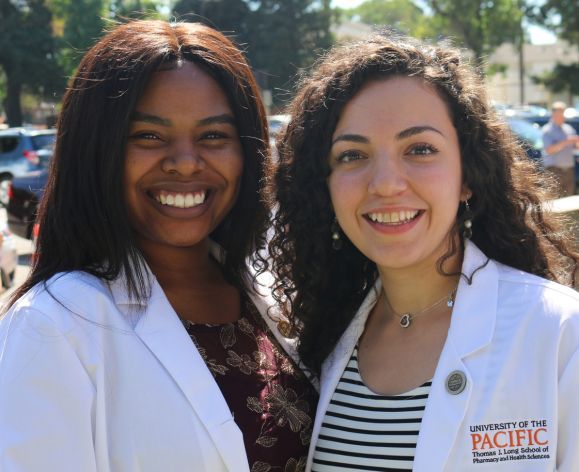 PharmD students in white coats