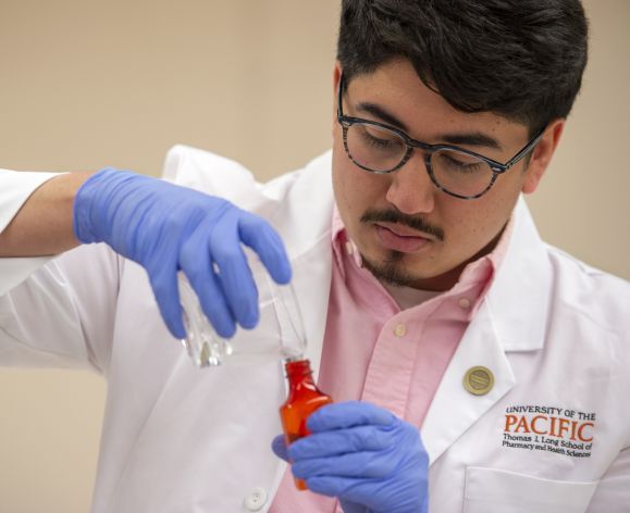 Pharmacy student working in a lab at the University of the Pacific