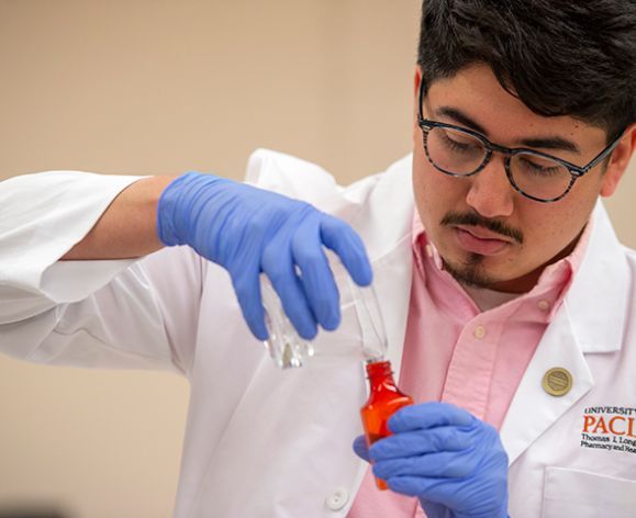 Pharmacy student working in the lab